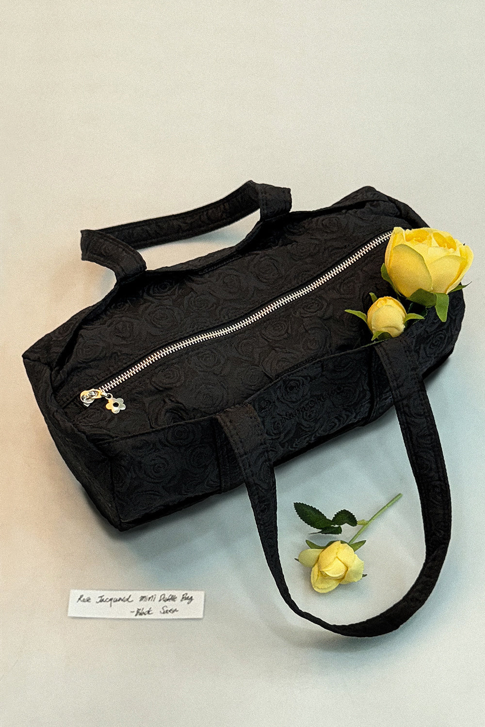nana-crew-ss-26-rose-jacquard-mini-duffle-bag-black-satin-black-s