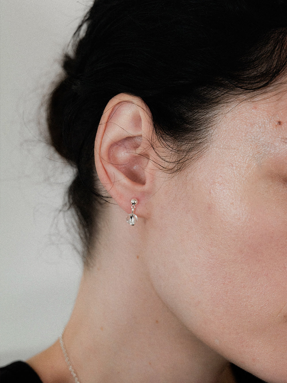 midnight-moment-ss-26-oblique-clear-mini-earring-silver-s