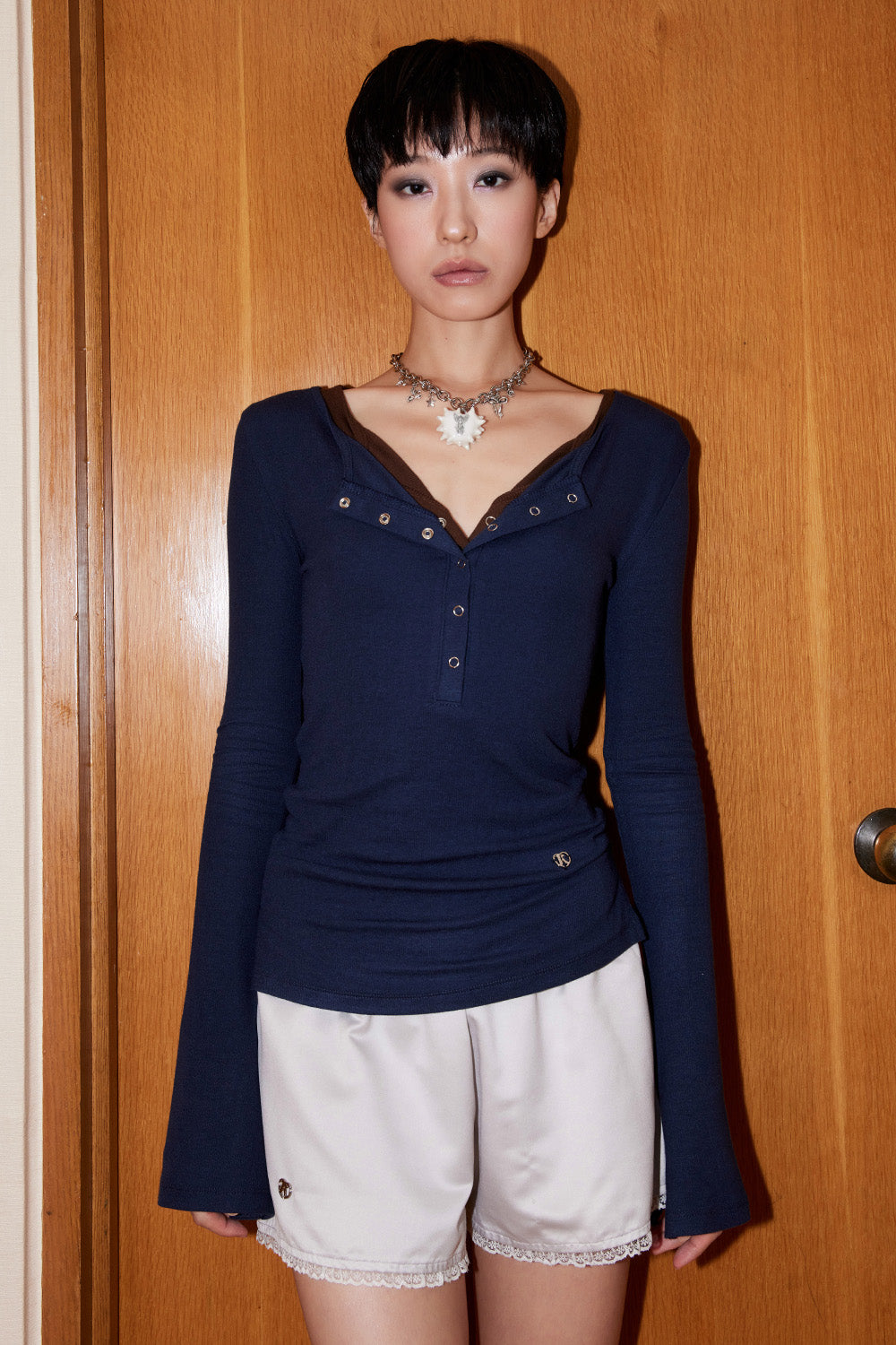 fakiii-ss-25-button-bell-line-knit_navy