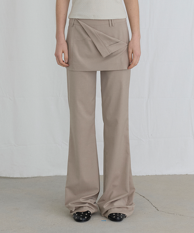 ordes-ss-25-folded-skirts-over-pants-beige