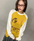 wonder-visitor-fw-25-yurina-raglan-ls-t-mustard-mustand-s