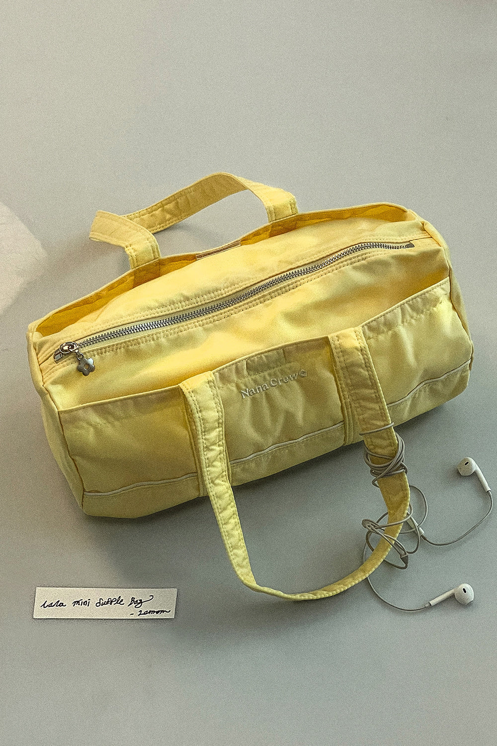 nana-crew-ss-26-nana-mini-duffle-bag-lemon-black-s