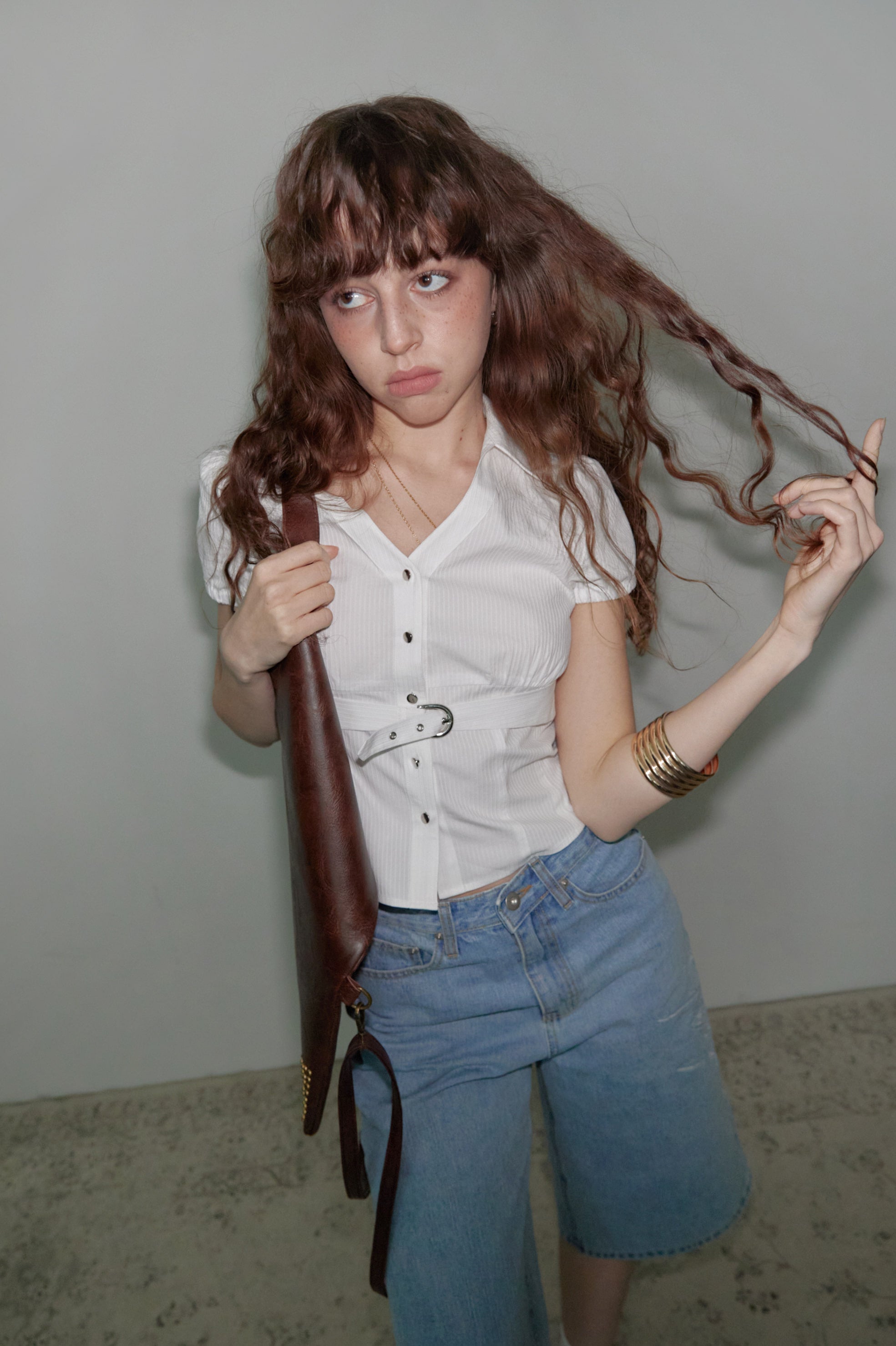 venecy-ss-25-buckle-strap-blouse