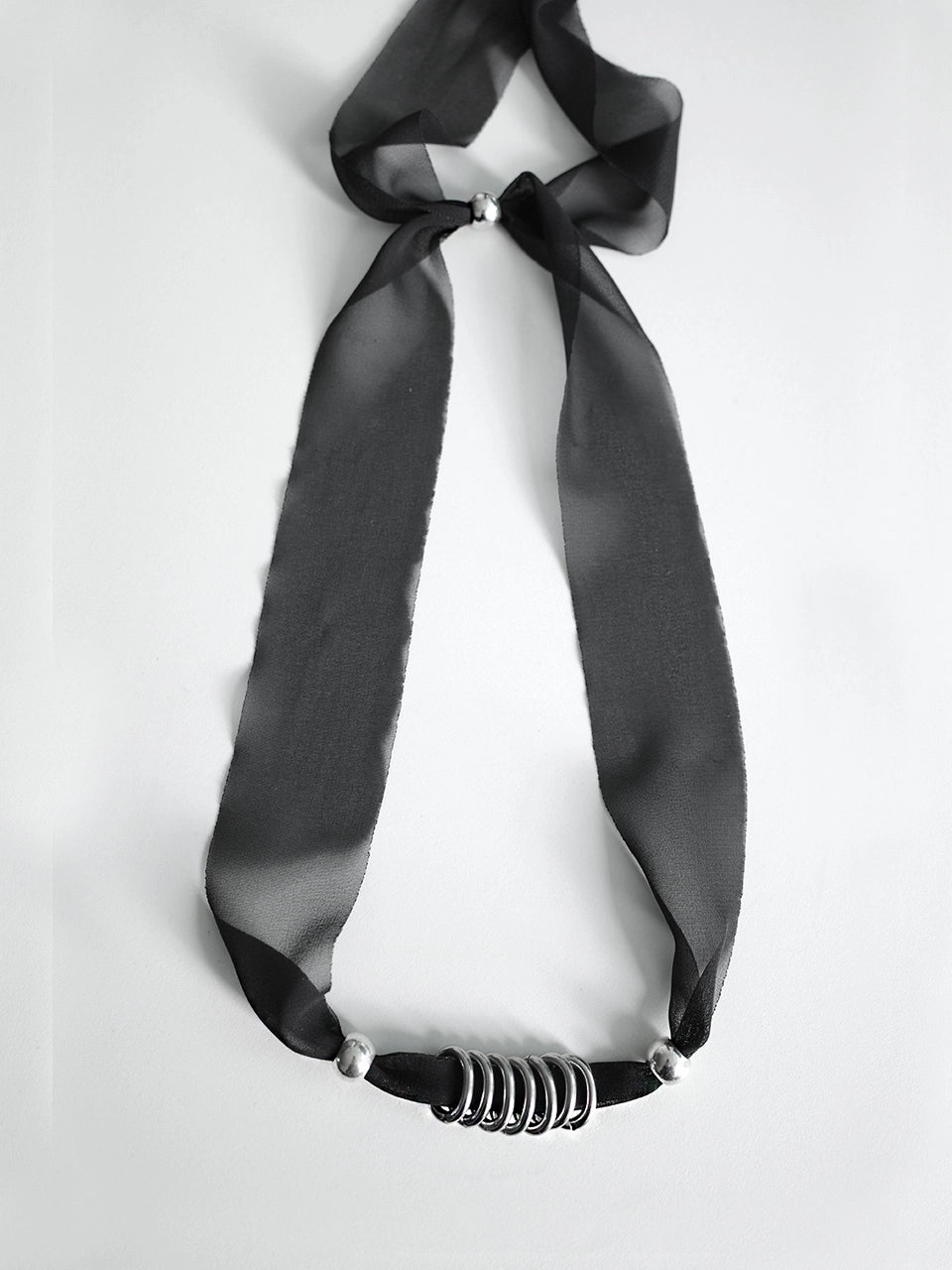 dazzling-club-fw-25-ring-necklace-black-s