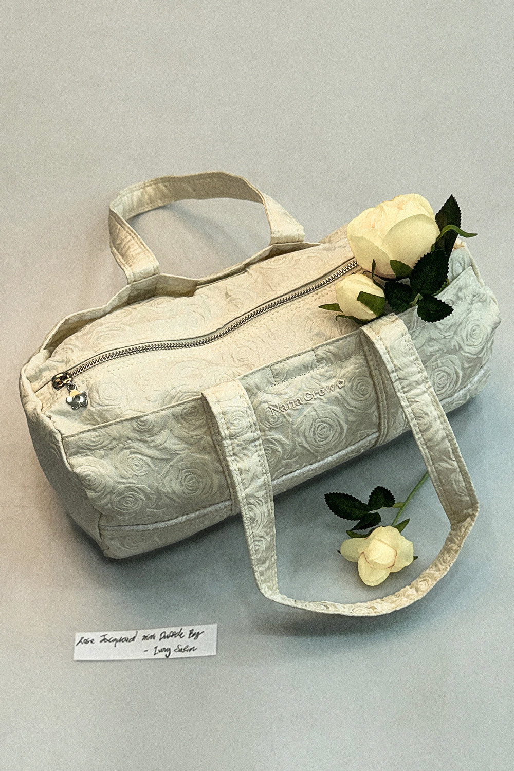 nana-crew-ss-26-rose-jacquard-mini-duffle-bag-ivory-satin-ivory-s