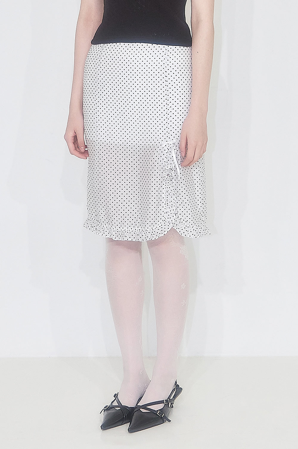 illigo-ss-25-dot-seethrough-midi-skirt-white