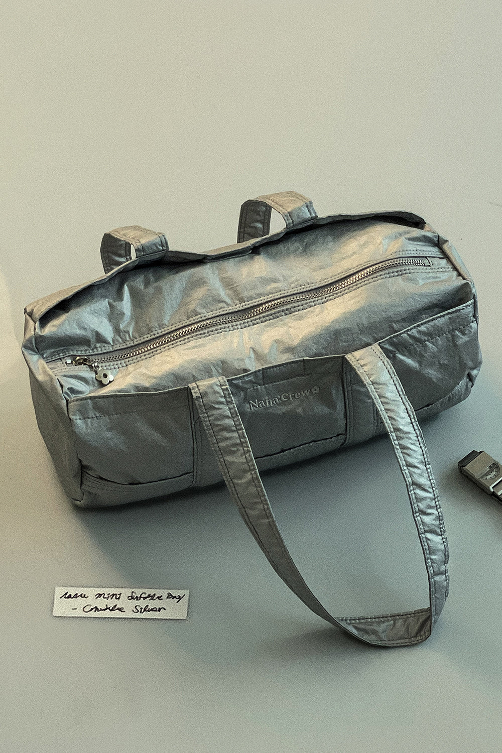 nana-crew-ss-26-nana-mini-duffle-bag-crinkle-silver-silver-s