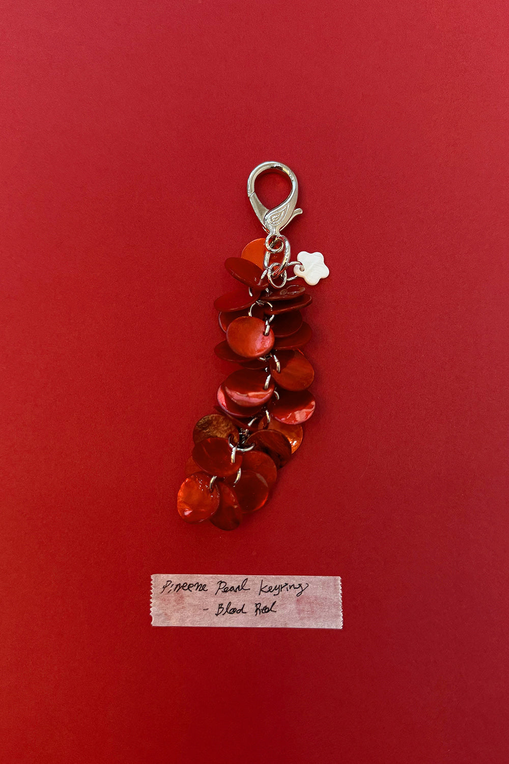 nana-crew-fw-25-pinecone-pearl-keyring-blood-red-blood-red-s