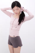 innermuseum-ss-25-dot-button-crop-cardigan-(pink)