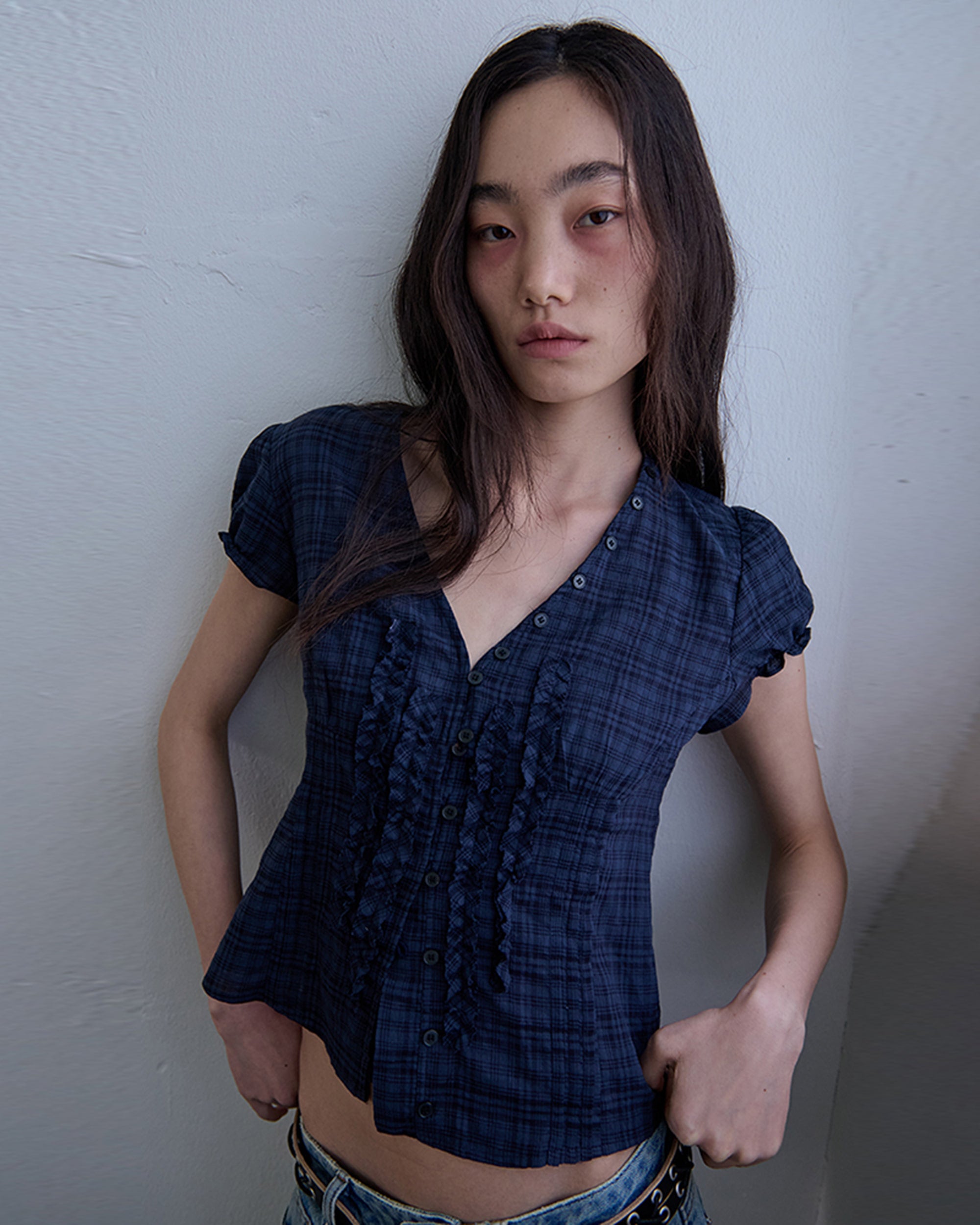 ordes-ss-26-raw-edge-ruffle-blouse-navy-navy-s