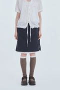 mausoleum-fw-26-dot-frill-layered-skirt-navy-s