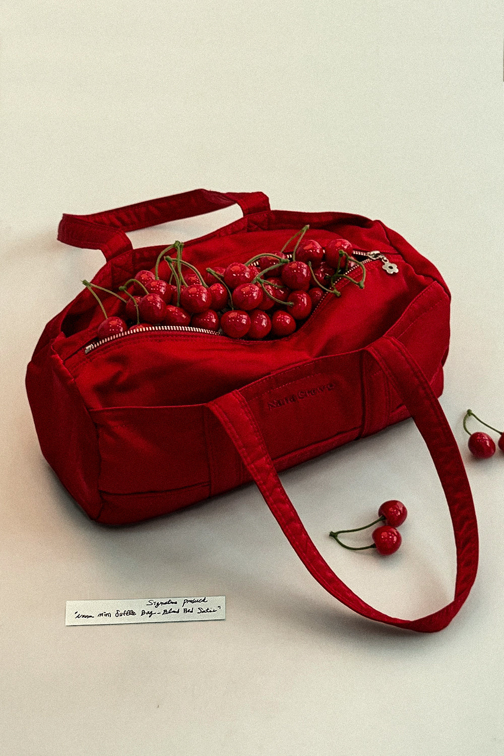 nana-crew-ss-26-nana-mini-duffle-bag-blood-red-satin-red-s