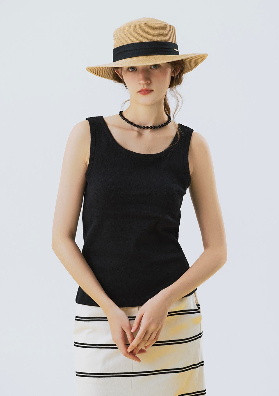 opendoorstudio-ss-25-punching-cap-sleeveless-black