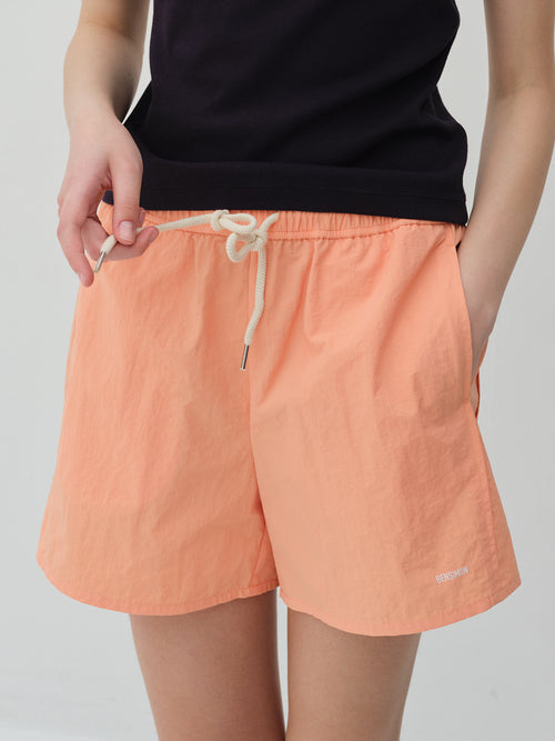 bensimon-ss-26-nylon-banding-shorts-peach-fuzz-peach-fuzz-s