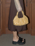otie-seasonless-wiffle-bag-glossy-yellow-brown
