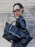 otie-fw-26-tied-ark-bag-grain-black-black-s