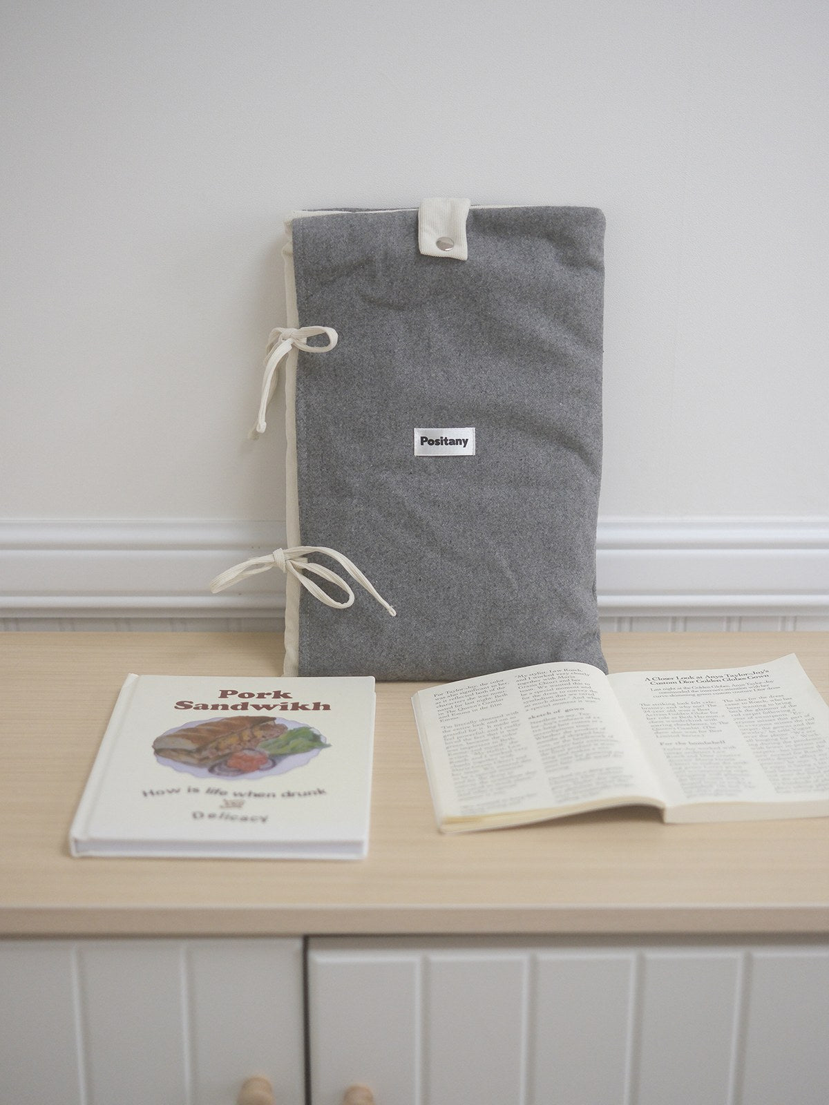 POSITANY Snug ribbon pouch cream grey